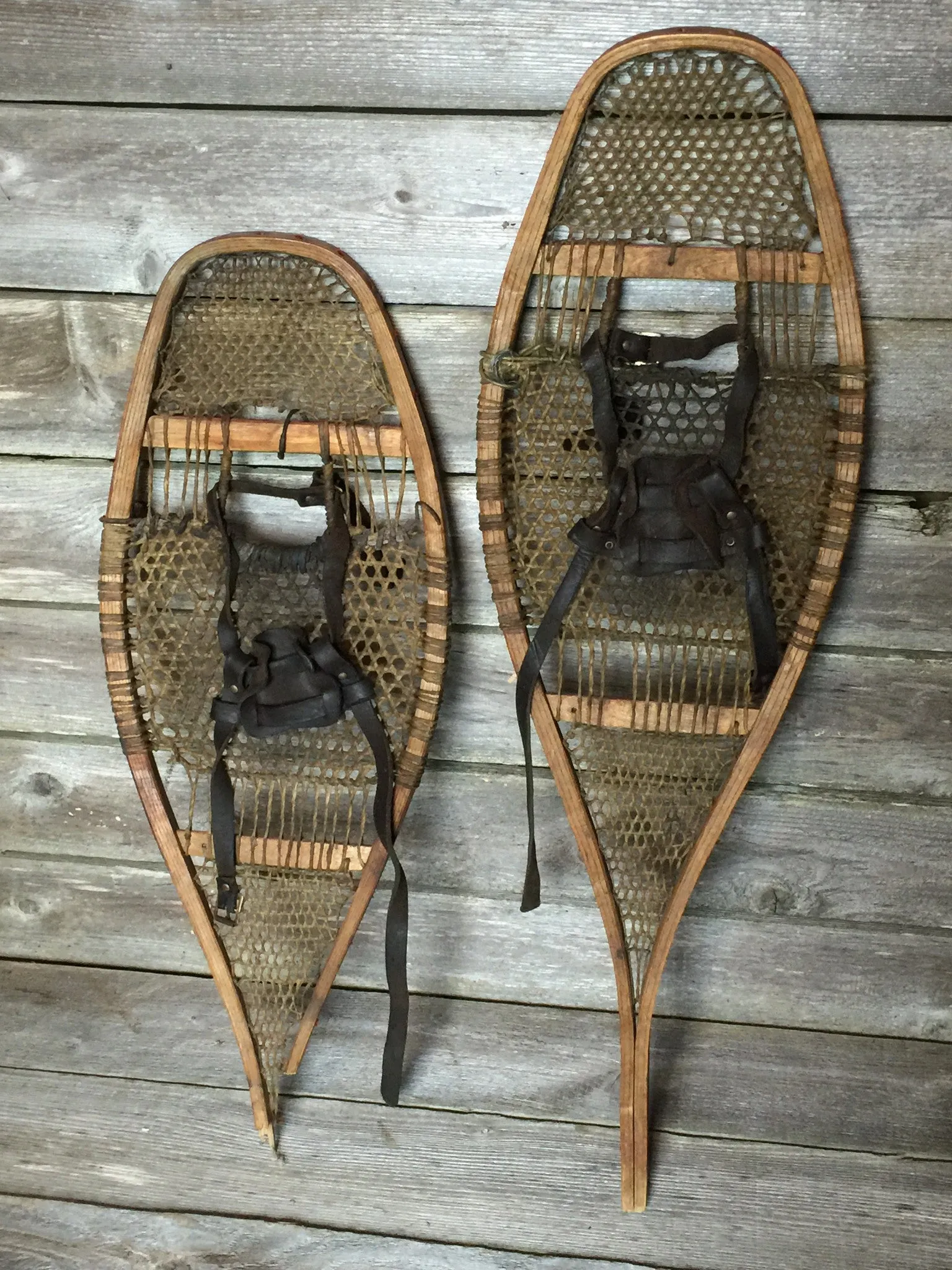 Antique Native American Snowshoes with pom poms