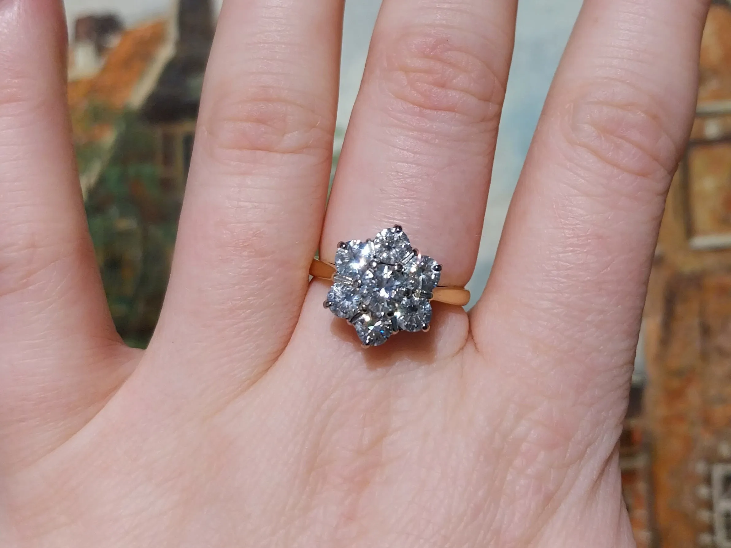 Brilliant cut diamond cluster ring