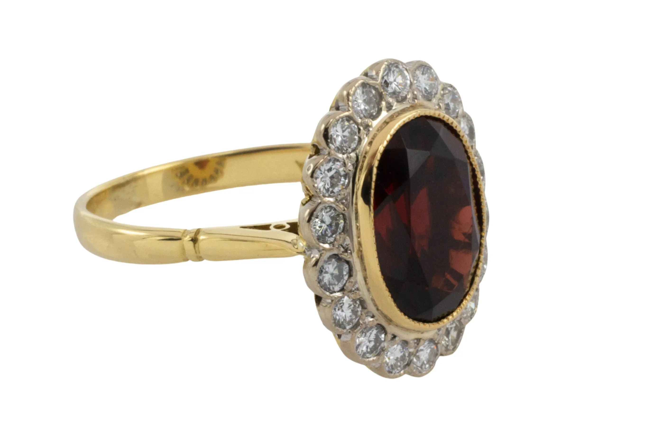 Vintage 18 carat garnet and diamond ring