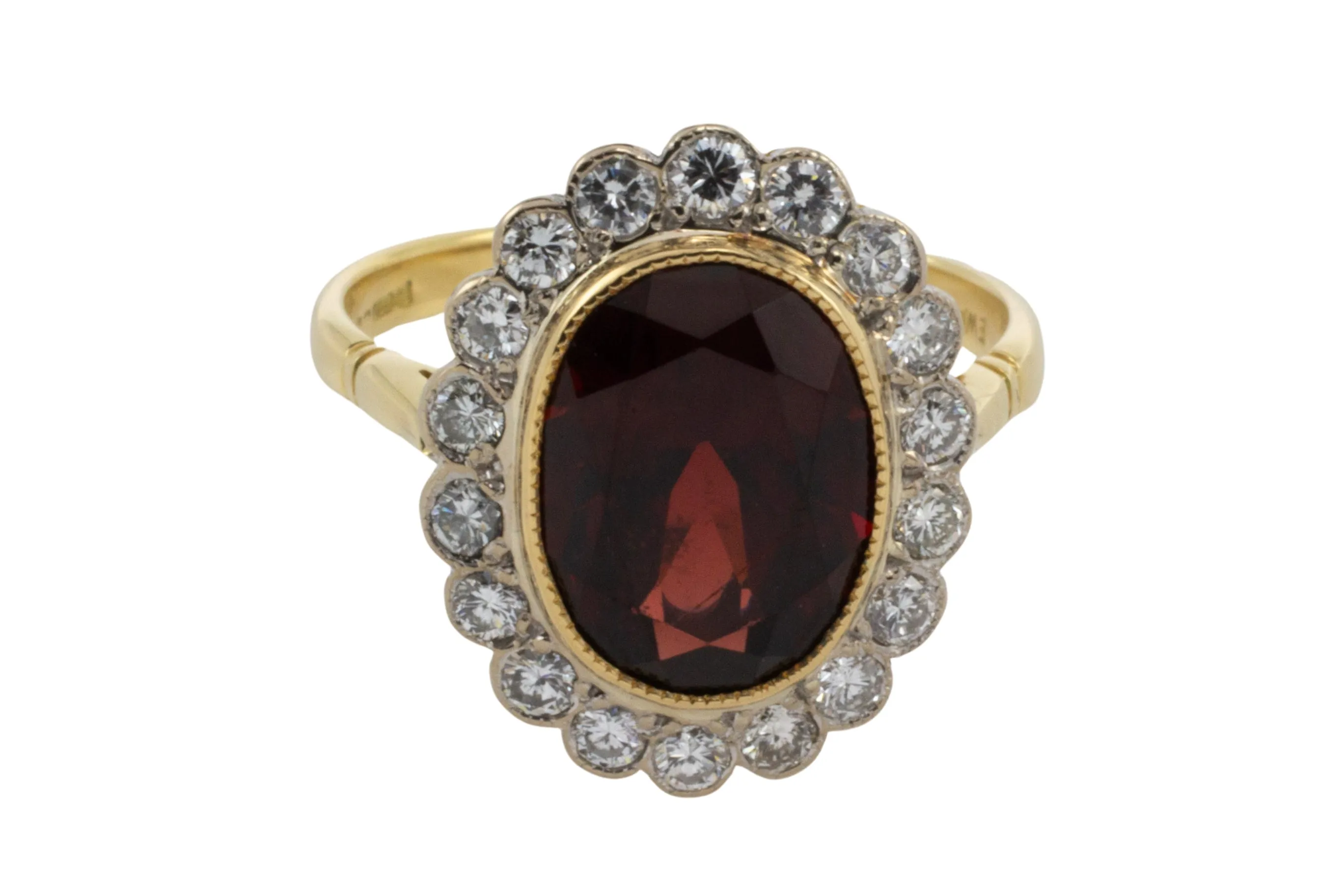 Vintage 18 carat garnet and diamond ring