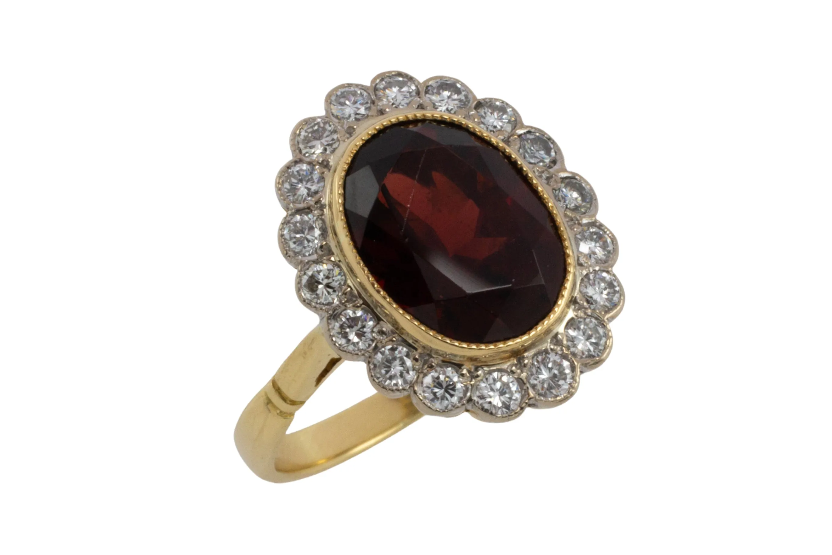 Vintage 18 carat garnet and diamond ring